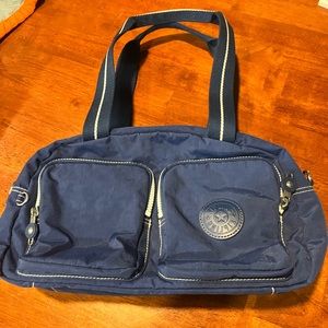 Kipling blue hand bag/purse